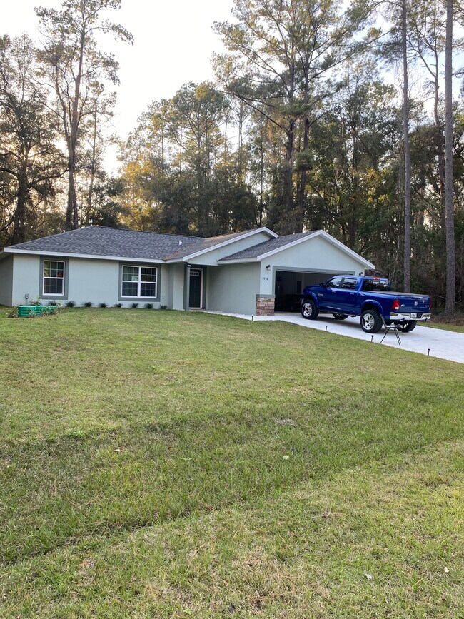 Building Photo - 10448 N Athenia Dr