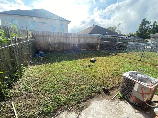 Building Photo - 9016 Amour Dr