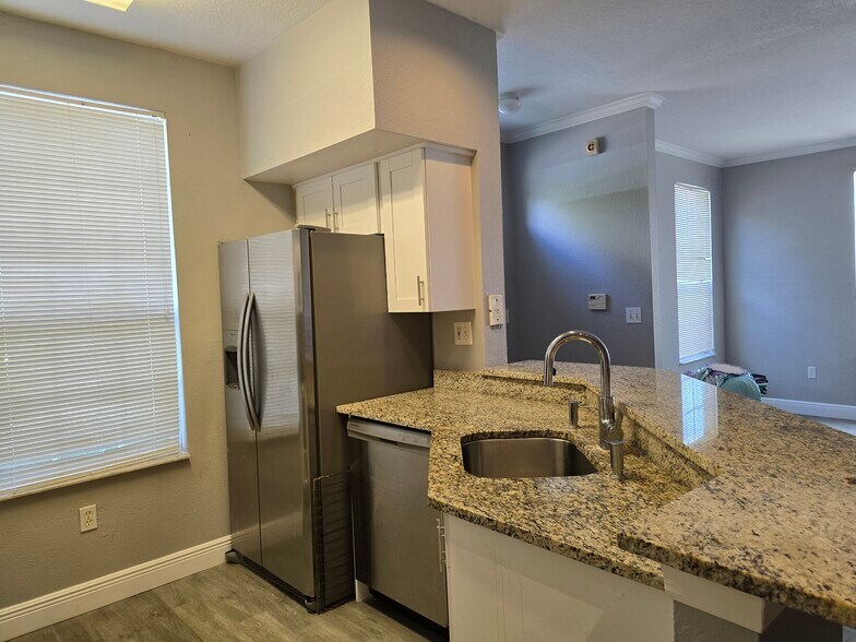 Building Photo - 9058 Lake Chase Island Way