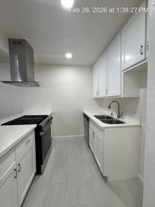 Building Photo - Upstairs unit available now!