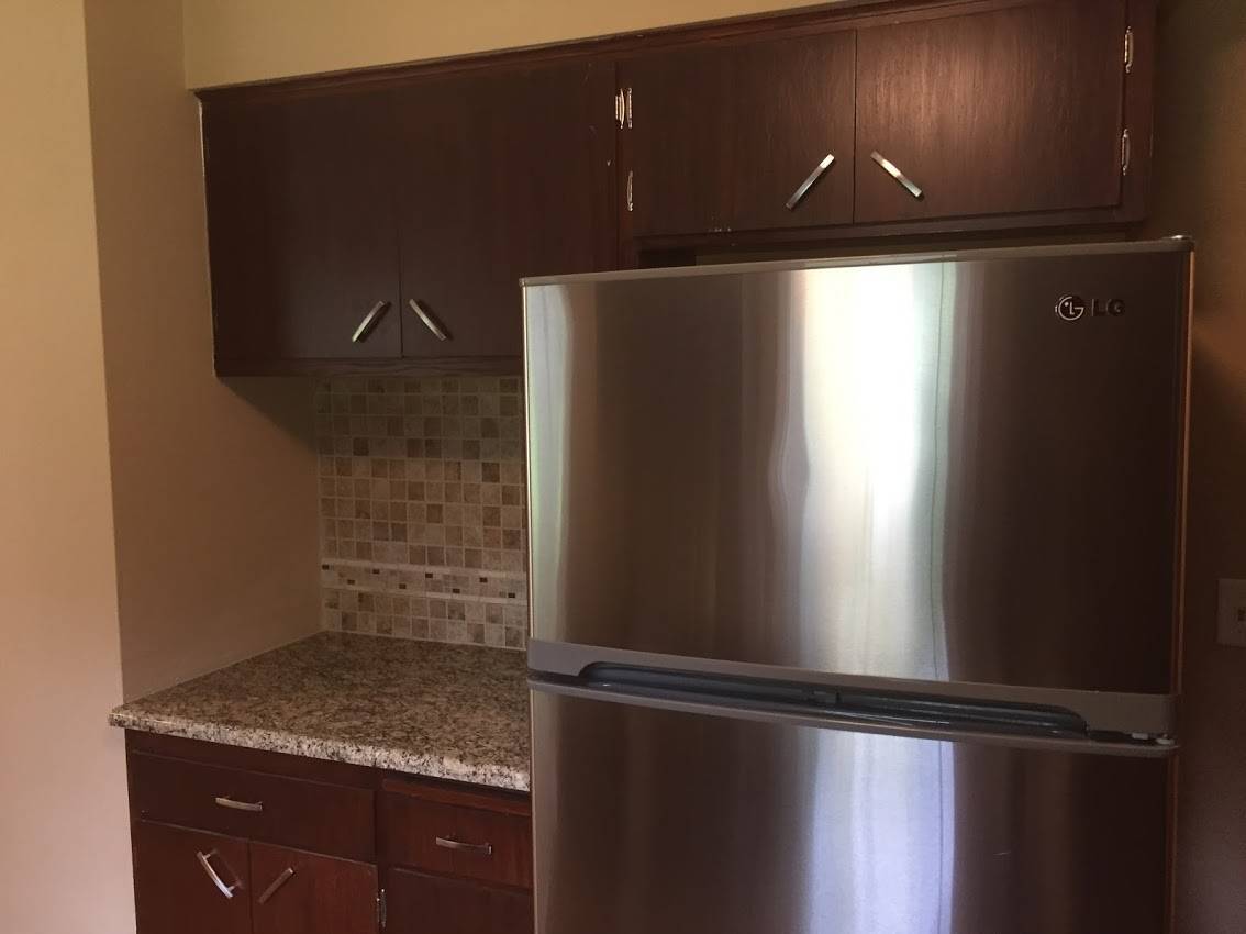 SS Refrigerator - 1026 W Lorain St
