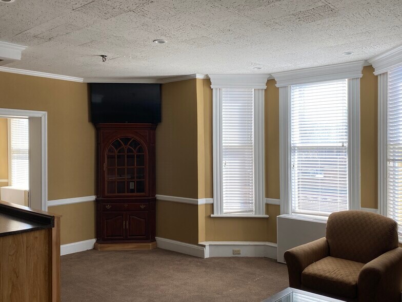 Section of Mail Living Room with TV - 940 4th Ave