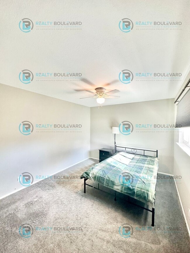 Building Photo - 2-bed, 2-bath, 2-story townhome with pool and park like setting outside the front door.