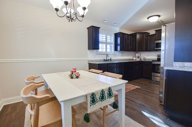Building Photo - Pet Friendly Three Bedroom with Bonus!