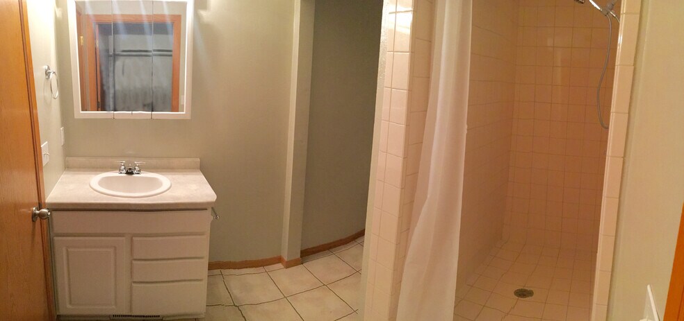 Master bathroom with shower and attached walk-in closet - 325 Cordy Lane