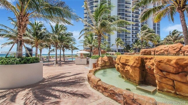 Building Photo - 18201 Collins Ave
