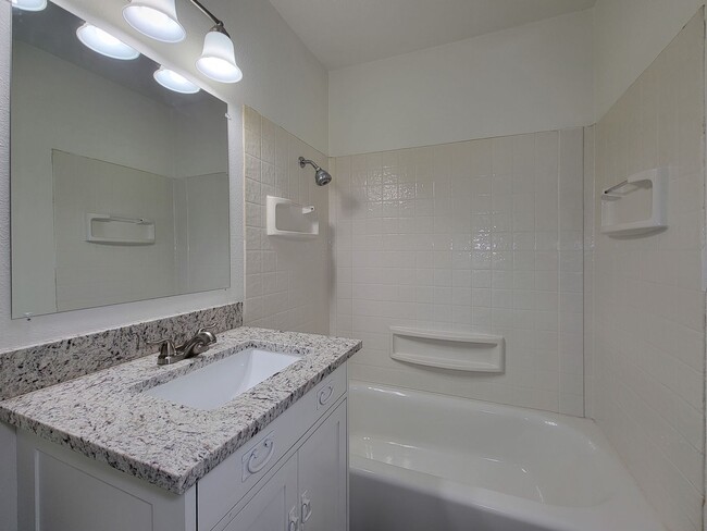 Building Photo - This fully renovated 3-bedroom, 2-bath home features a modern kitchen, large master suite with a ...