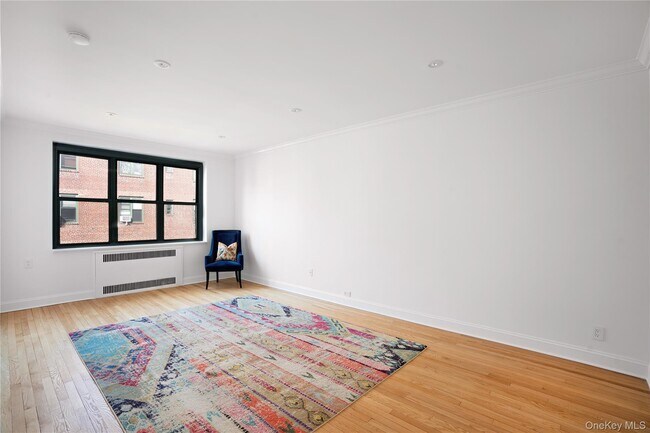 Building Photo - 34-40-40 79th St