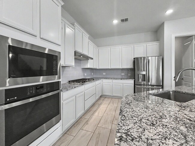 Building Photo - Modern Elegance in Cibolo Canyons | 4 Bed | 3.5 Bath | 3-Car Tandem Garage