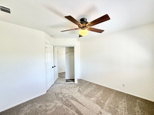 Building Photo - Spacious 5 Bedroom 3 Bathroom Home with Updated Paint, New Roof & Private Balcony
