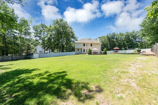 Building Photo - Private Cul-de-Sac Living: 4BR Home with Pool & Geothermal HVAC