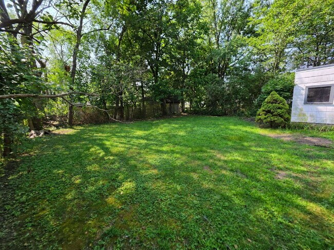 Building Photo - 2 Bedroom, 1 Bathroom West Hill Home with Fenced Yard, Garage, & Bonus Living Space