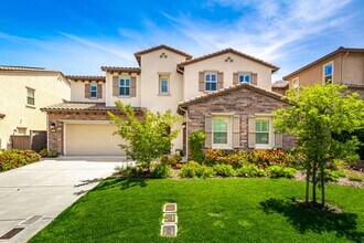 Building Photo - Gorgeous Custom Upgraded Serrano Home!
