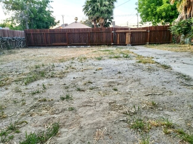 Building Photo - READY NOW! Newly Renovated! 4 Bdrm + Large Fenced Yard