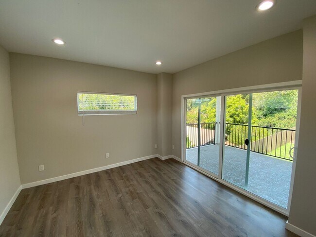 Building Photo - NEW (2023) 4BD/2BA!! Back gate exits right...