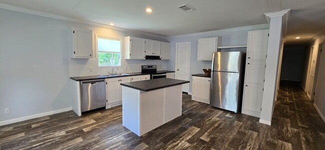 Building Photo - 55+ community Sylvan Grove / move in Special!