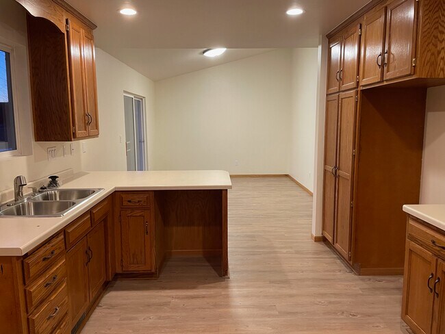 Kitchen, dining room - 1023 Rolling Meadows Dr