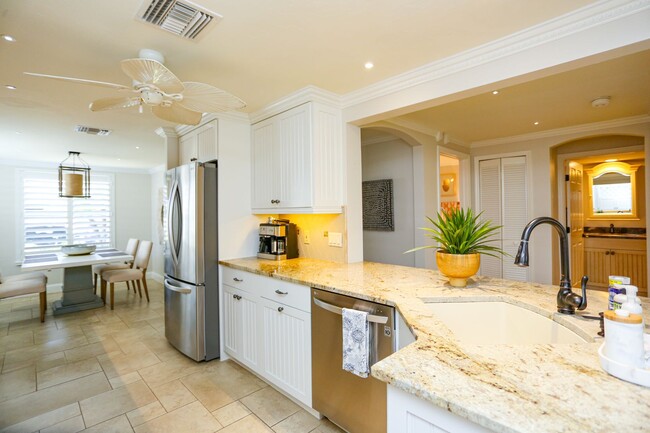 Building Photo - Live the Naples Lifestyle – Elegant 2BR/2B...