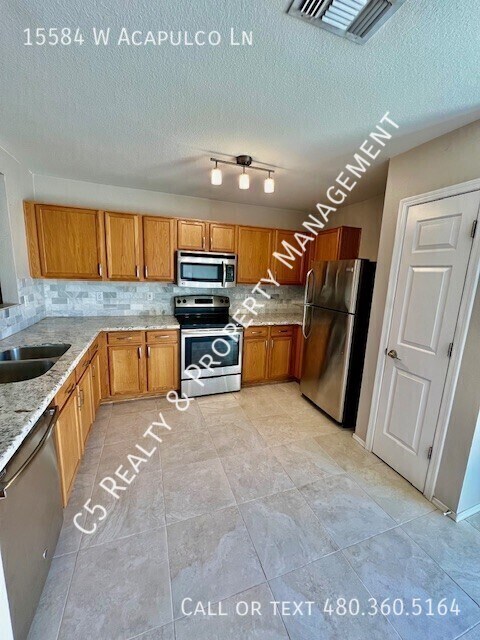 Building Photo - 15584 W Acapulco Ln