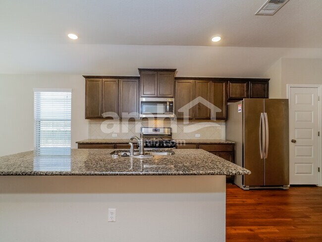 Building Photo - 8105 Cottage Rose Dr