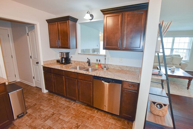 Building Photo - Pet Friendly Three Bedroom with Bonus!