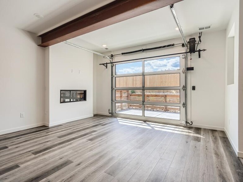 Living room with fireplace! Natural sunlight and privacy - 6361 Nelson Way