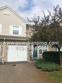 Building Photo - Shoreview Townhouse Available October 1, Open Floor Plan, Jacuzzi Tub, Fireplace, Attached Garage