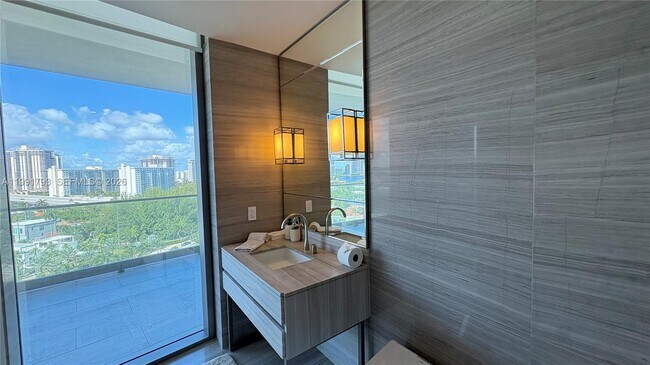 Building Photo - 18975 Collins Ave