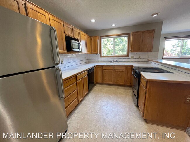 Building Photo - 3 br, 2.5 bath House - 2438 SOUTHSLOPE WAY