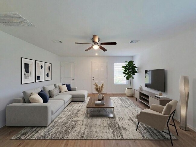 Building Photo - This single-story home has a comfortable layout with three bedrooms and a living area all on one ...