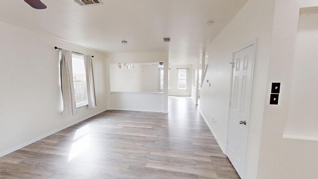 Building Photo - Expansive Living and Stylish Updates in So...