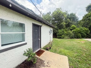 Building Photo - Open floor plan, four-bedroom two-bathroom with washer and dryer