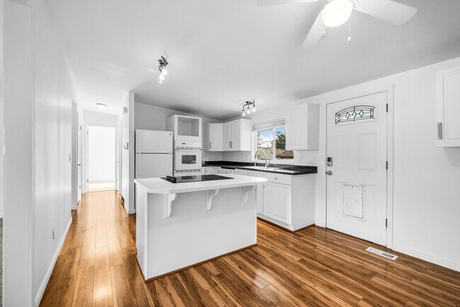 Building Photo - Spacious 4-Bedroom Layton Home with Finished Basement and 2-Car Garage