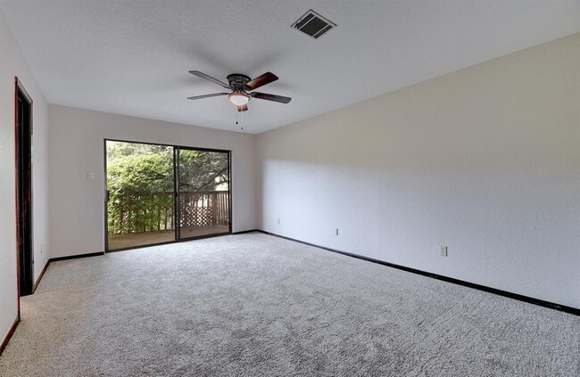 Building Photo - 10 Cypress Fairway Village