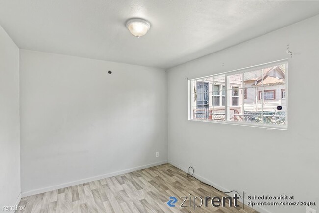 Building Photo - 2 br, 1 bath Triplex - 1466 77th Avenue, O...