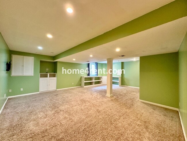 Building Photo - Beautiful Four-Bedroom Home with Three Car Garage, Wood Floors, Finished Basement and a Fenced Ya...