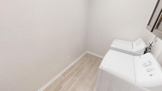 Building Photo - Welcome home to this beautifully designed 4-bedroom, 2.5-bathroom gem!