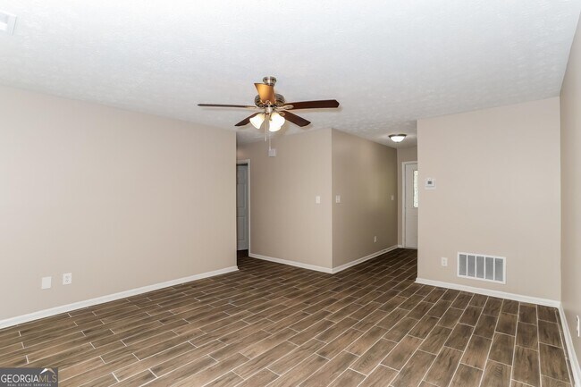 Building Photo - 9073 Woodgreen Way