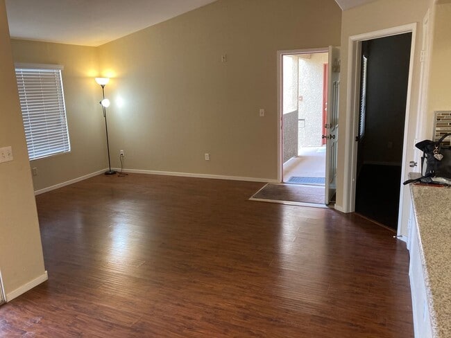 Building Photo - Gated community just minutes south of the strip, 2br/2bath, 2nd floor condo.