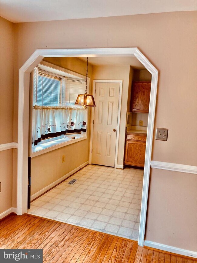 Building Photo - 6830 Red Rose Village Dr