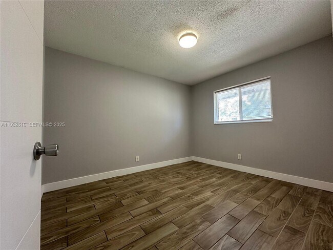 Building Photo - 647 NW 3rd Ave