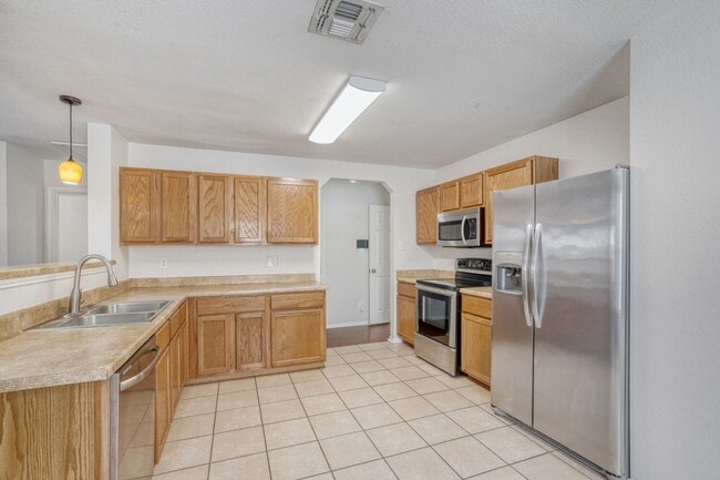 Building Photo - Charming & Spacious 4 Bedroom 2 and Half bath Home with Open Living, Modern Updates, and Private ...