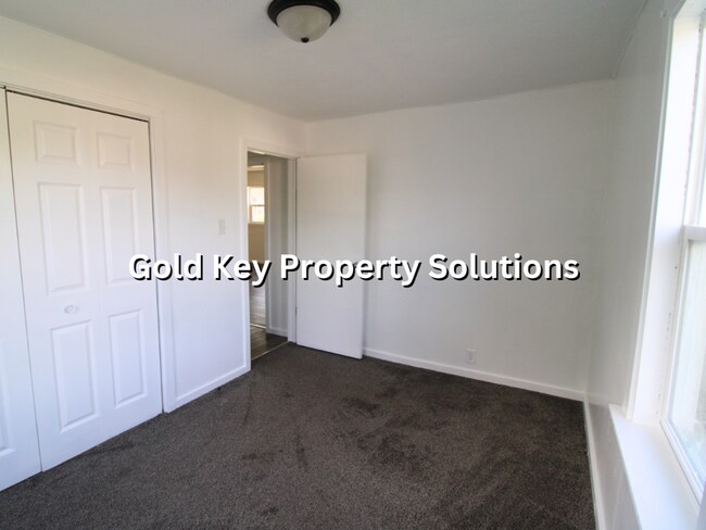 Building Photo - 2 BR 2 BA House with 2-Car Garage and Cent...