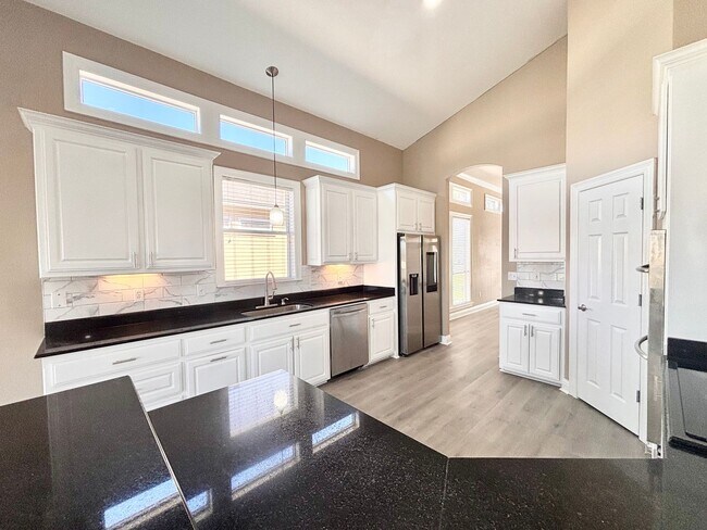 Building Photo - Stunning 5-Bedroom Home with Breathtaking Lake & Golf Course Views – Pelican Point Subdivision