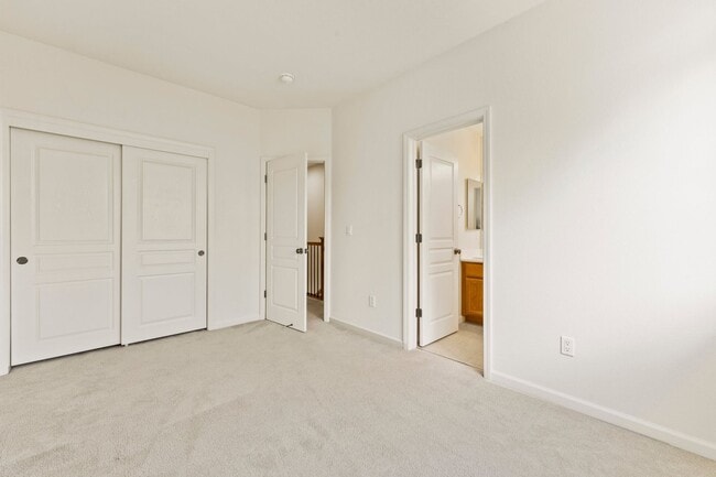 Building Photo - SUNNY TOWNHOME NEAR TRAILS STYLISH, FUNCTIONAL, & VERY ACCESSIBLE