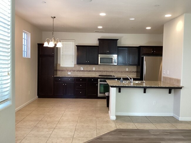 Building Photo - 7009 Harmony Dr