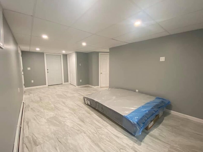 Bedroom toward bathroom - 24 Riverdale Ave