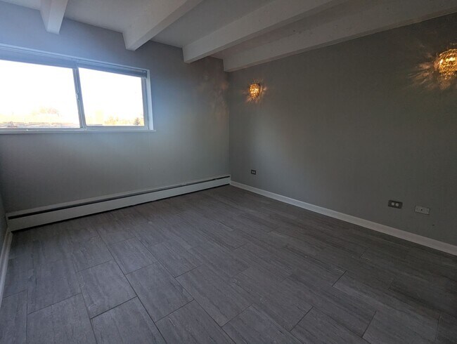 Building Photo - FABULOUS PEARL STREET CONDO IN SECURE BLDG...