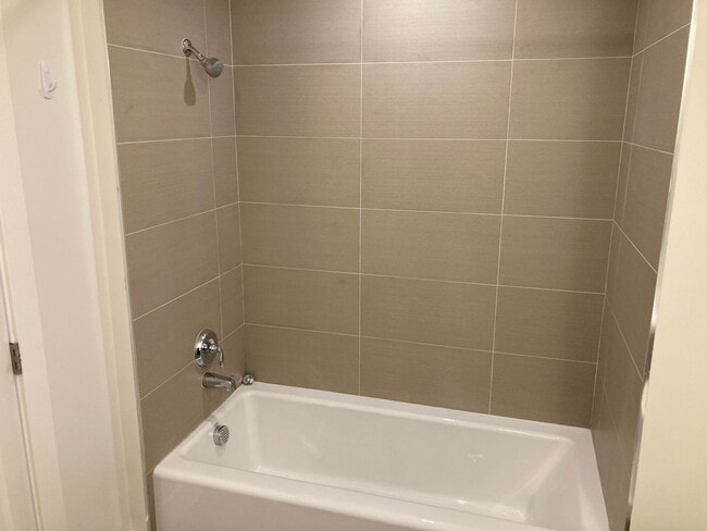 Building Photo - Live at the beach! Modern 2 bedroom 2 bath condo blocks from the beach w/parking and washer/dryer...