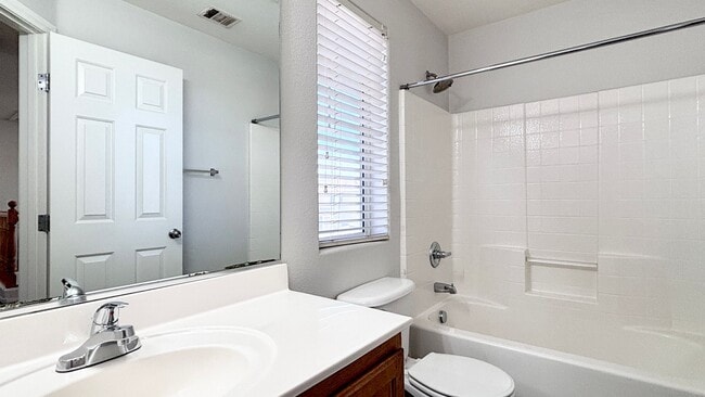 Building Photo - 2-story home with a Beautiful Sparkling Pool! Great floor plan!